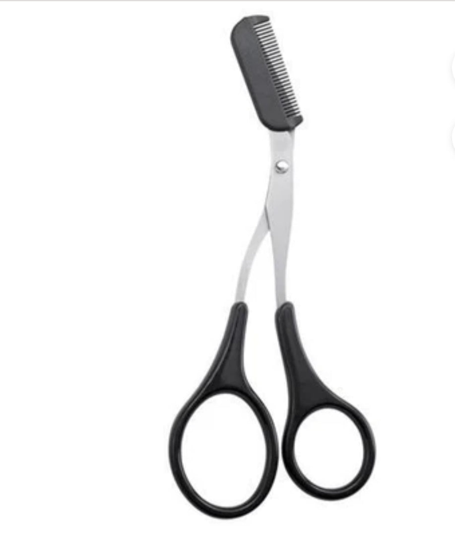 Pink eyebrow trimming scissors
